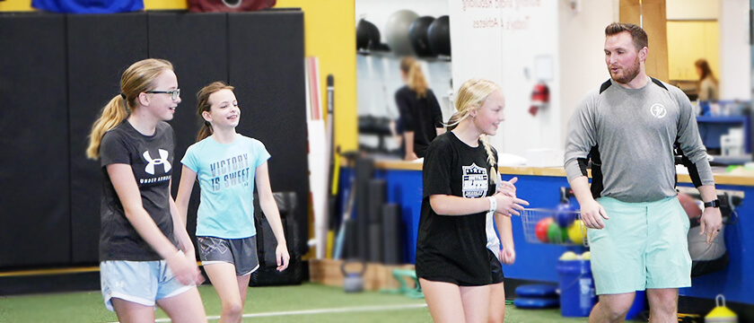 Coach Teaching a Jump Start Class