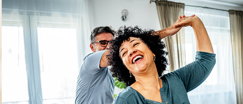 Couple Dancing in a Living Room