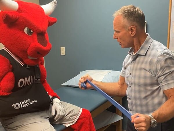 Durango and Dr. Kirk Hutton Discussing a Shoulder Injury
