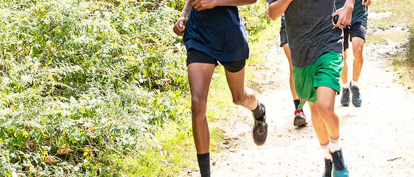 Group of Teens Running Outside