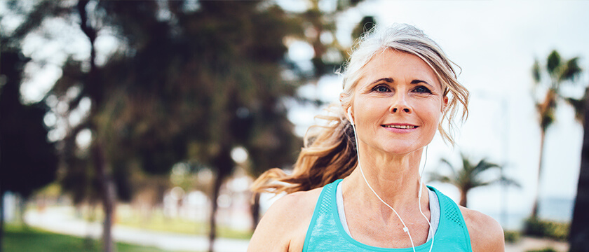 Woman Jogging with Airpods In