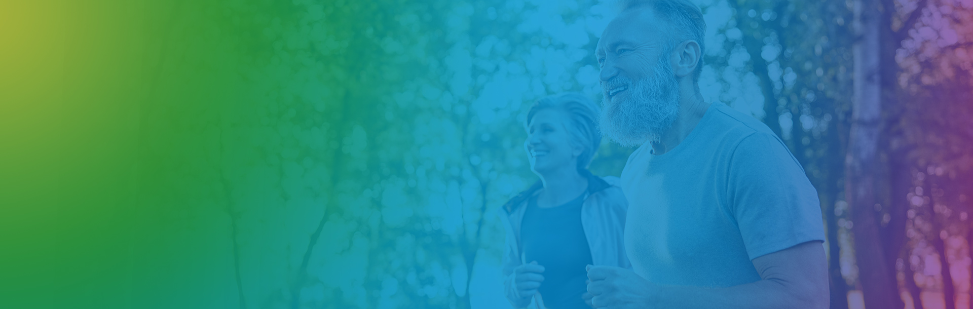 Older Couple Jogging in the Woods