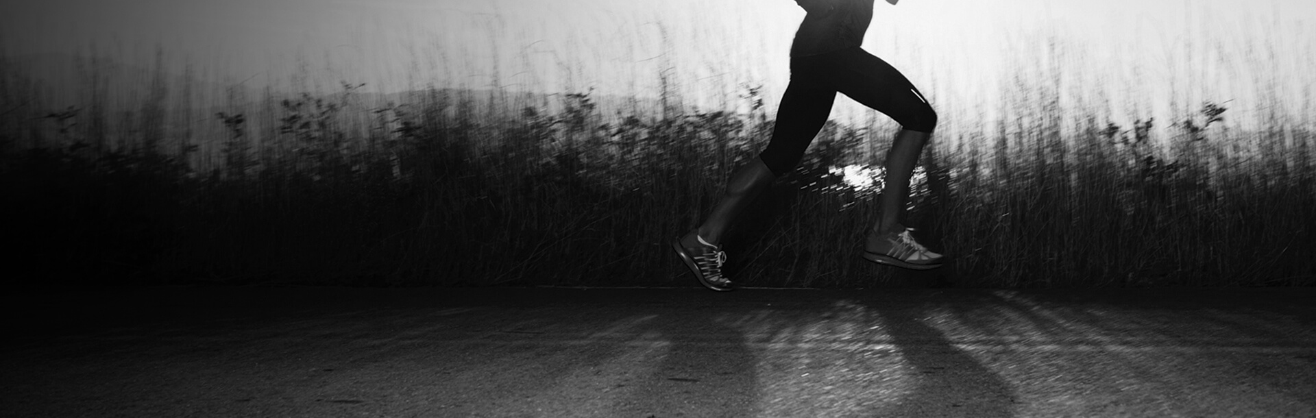 Optimum Stride: Woman Running On Road