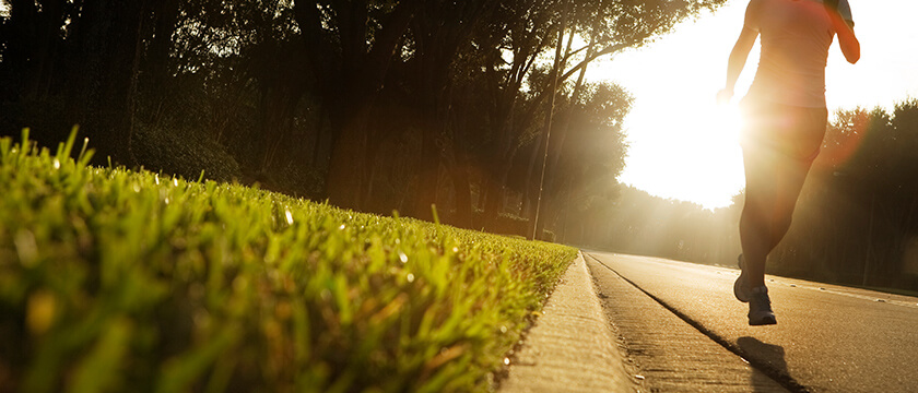 Runner on Street at Morning Sun