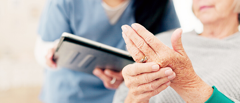 Woman Undergoing a Hand and Finger Exam