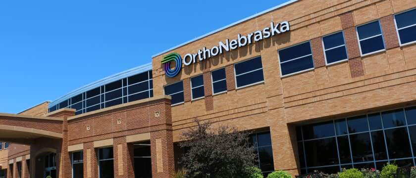 OrthoNebraska logo on building