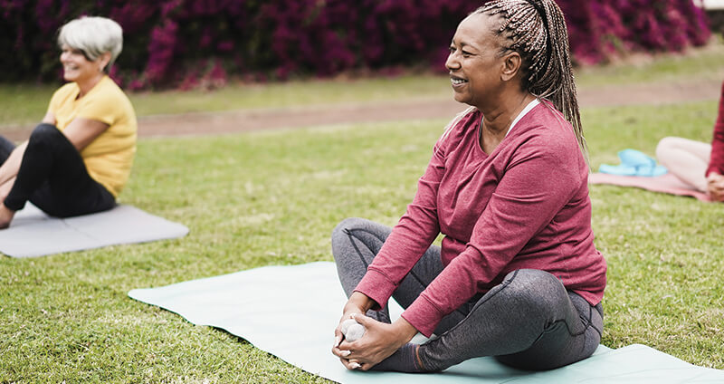 Woman Sitting and Doing Yoga