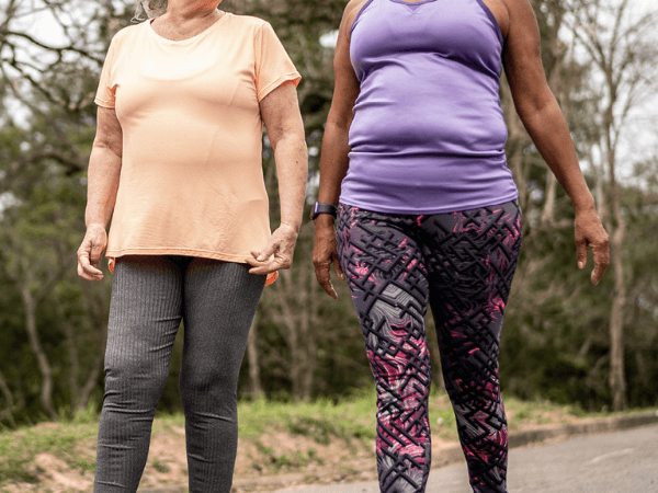 Women Walking Together in Athletic Clothing