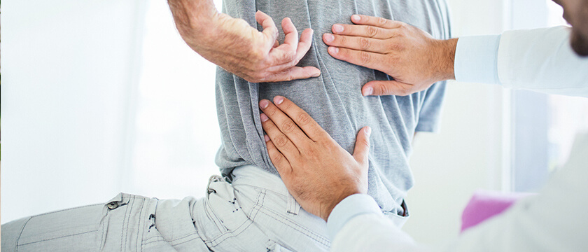 Doctor Conducting a Spine Exam